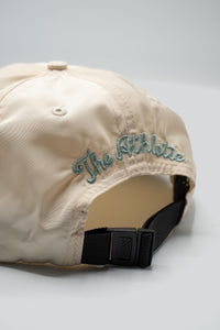 100% nylon hat with an embroidered rose on the front and "The Athletic" embroidered in the back