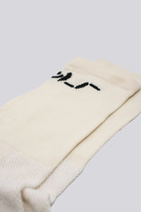 off white cycling running sock with shrug emoticon