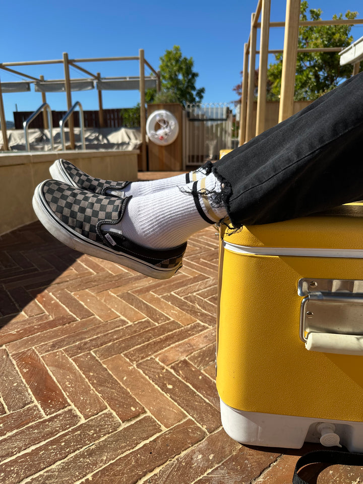 The Tiger Eye Triple Double Crew Socks are designed for versatility and comfort, featuring a fully padded foot and a relaxed ribbed cuff. Ideal for cycling, running, cross-training, or casual wear, these socks are made in the USA from recycled fibers, combining performance with sustainability
