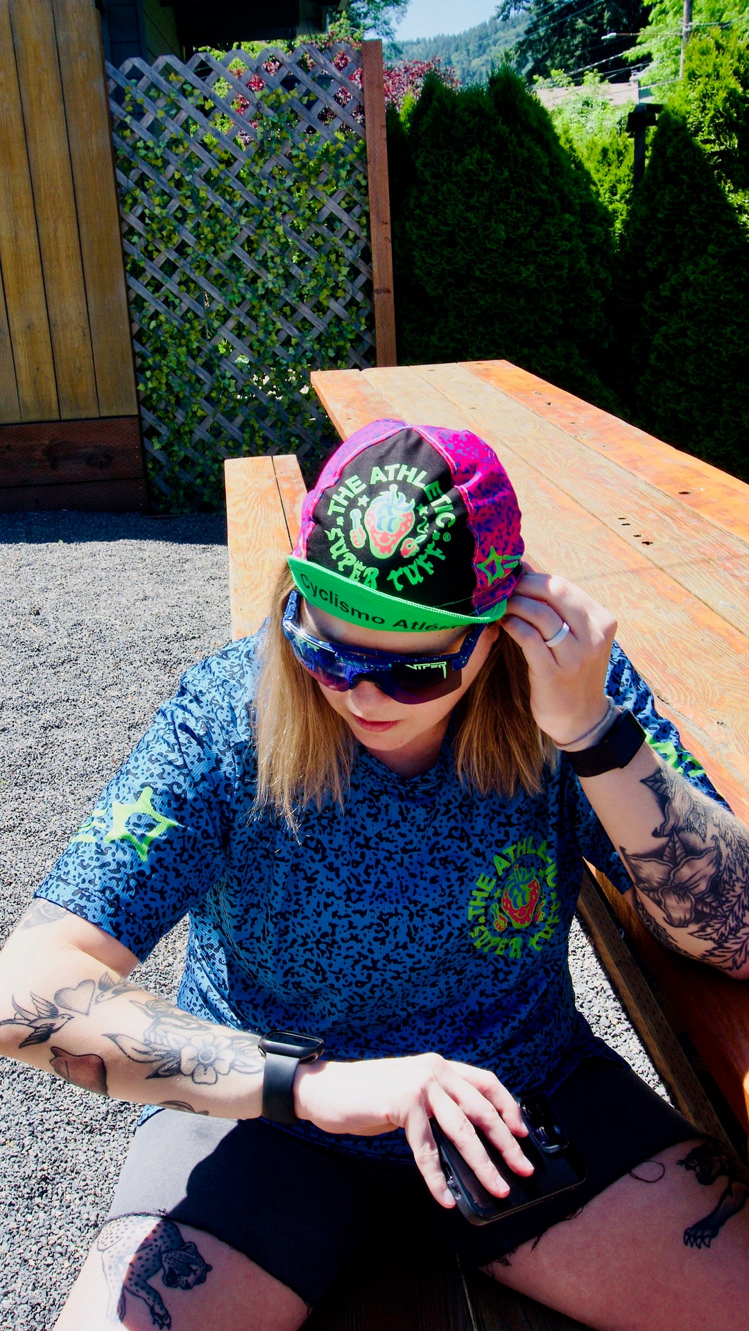 The Athletic Super Tuff Strawberry Cycling Cap is a vibrant, unstructured 3-panel cap featuring a bold strawberry design. Crafted in the Portland, OR, by Double Darn, this cap offers a comfortable fit.