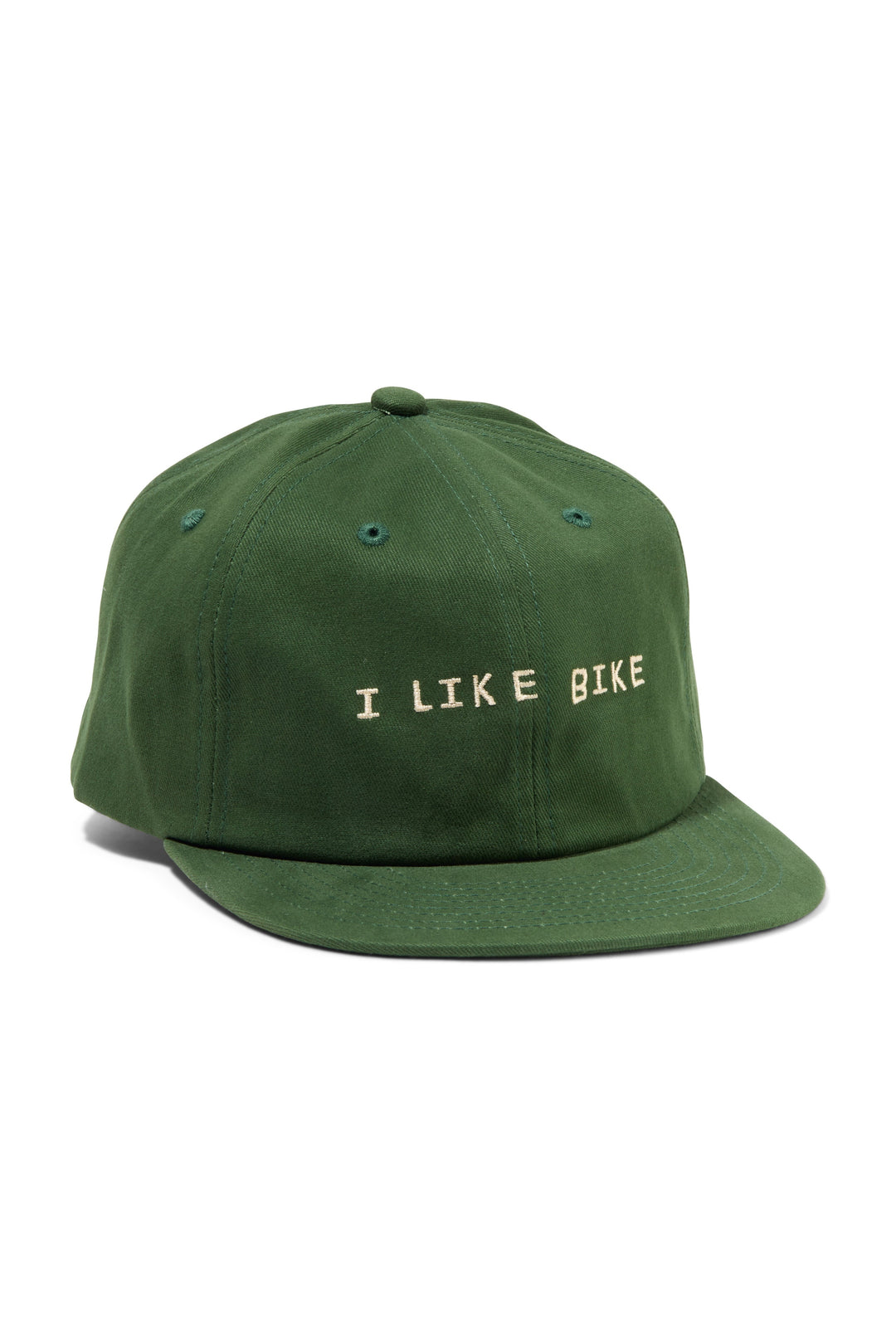 The I LIKE BIKE Hat is a green, 6-panel cap featuring the embroidered phrase "I LIKE BIKE" in white. It includes an adjustable fabric strap with a brass metal clasp for a customizable fit. Made from 100% cotton, this hat offers comfort and style for cycling enthusiasts