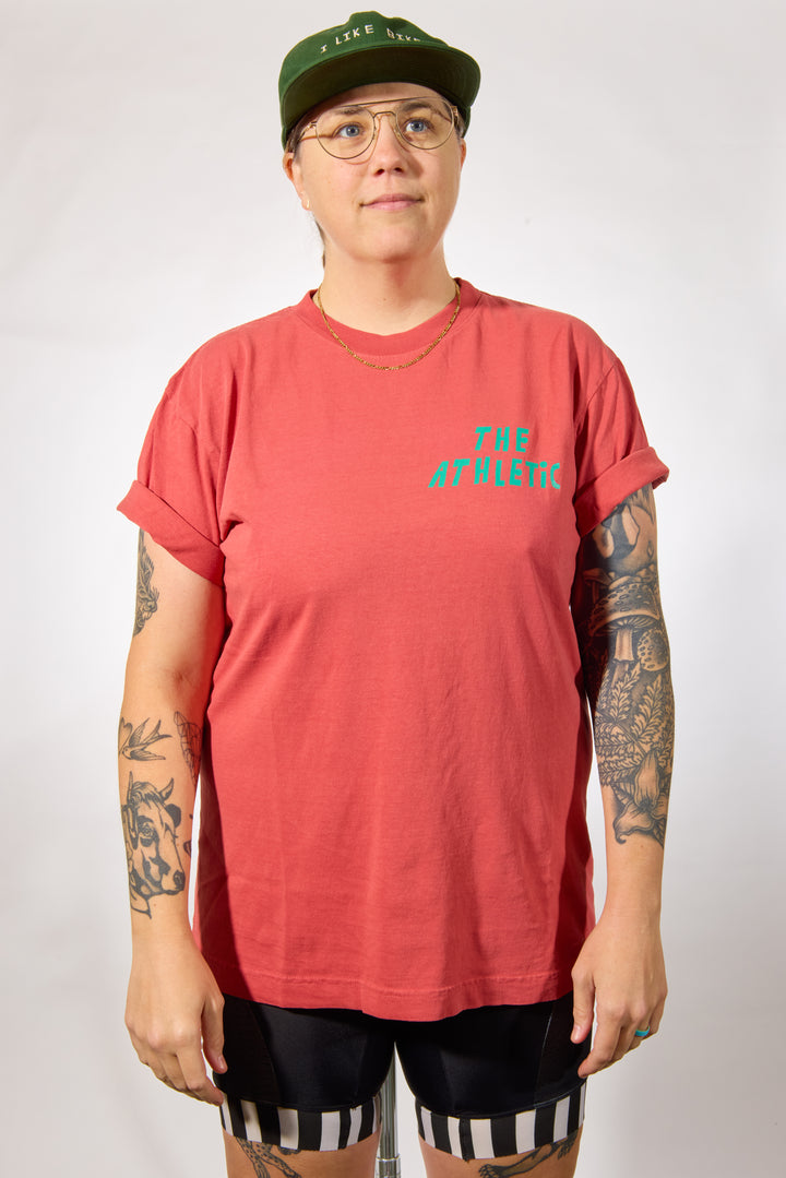 The I LIKE BIKE Unisex Tee is a midweight, 6.5 oz jersey made from 100% North American reclaimed waste cotton. This preshrunk, biodegradable shirt features a tubular body and is knit, sewn, and finished in Los Angeles, California, with a fair-wage workforce. Designed for an oversized fit, it offers both comfort and sustainability for cycling enthusiasts