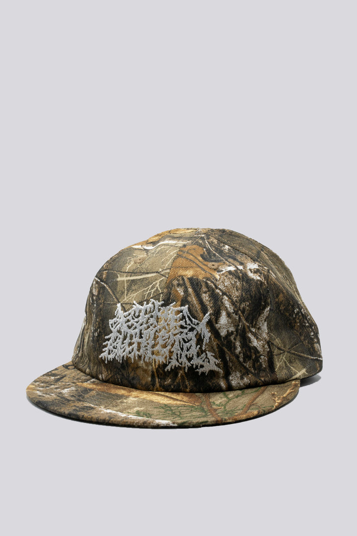 The Realtree Realness Cap is a versatile, unstructured 6-panel hat featuring a unique camo pattern that varies slightly with each cap, adding individuality to your gear. Designed in collaboration with Kyle Kelley, it includes a soft, regular-length bill and no top button, ensuring comfort under a helmet. Crafted in the USA, this hat is perfect for everyday wear and is easily packable for on-the-go adventures
