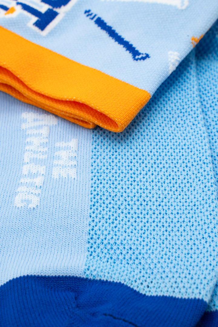 The Athletic Community's Custom Sock Program offers high-quality, eco-friendly socks made in the USA, ideal for cycling teams, running clubs, corporate gifts, or large family events.  You can submit your design or logo, and their team will collaborate with you to create the perfect custom socks