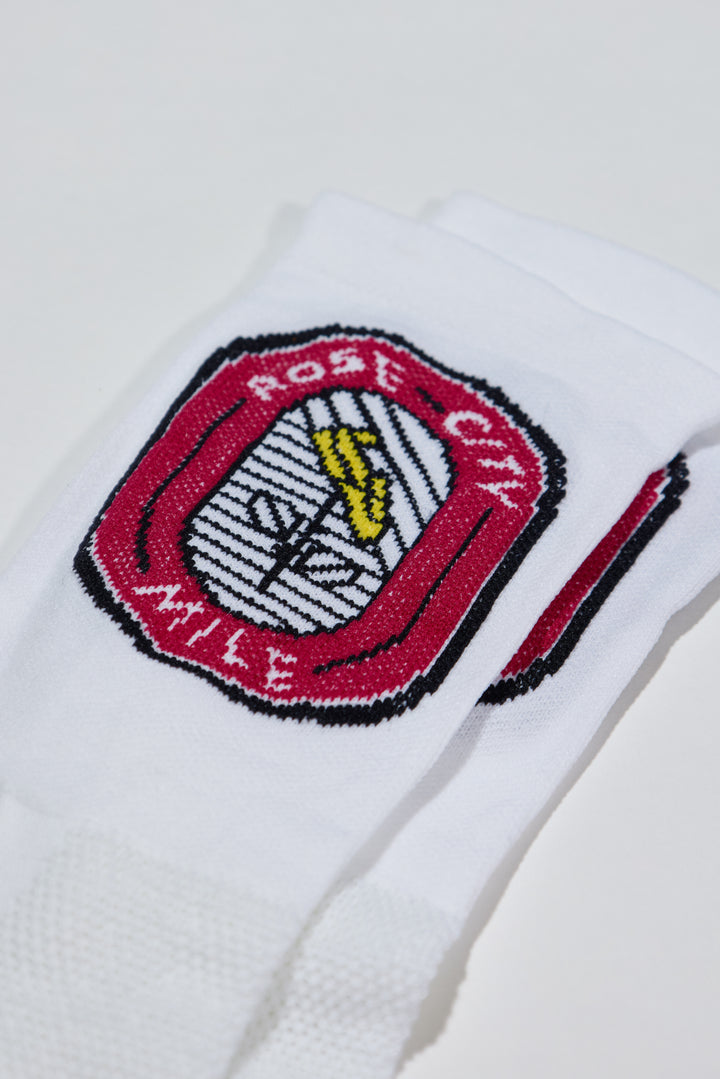 The Athletic Community's Custom Sock Program offers high-quality, eco-friendly socks made in the USA, ideal for cycling teams, running clubs, corporate gifts, or large family events.  You can submit your design or logo, and their team will collaborate with you to create the perfect custom socks