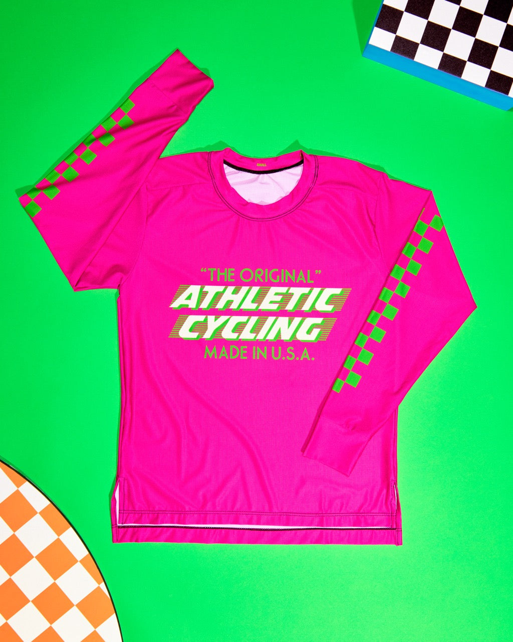 The Women's SUPER TUFF "The Original" Tech Shirt is a long-sleeve, moisture-wicking top designed for mountain biking, running, or road cycling. Made in the USA by Endo Customs, this versatile performance shirt offers comfort and durability for active women