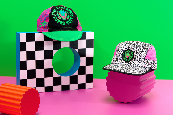 The Athletic Super Tuff Strawberry Cycling Cap is a vibrant, unstructured 3-panel cap featuring a bold strawberry design. Crafted in the Portland, OR, by Double Darn, this cap offers a comfortable fit.