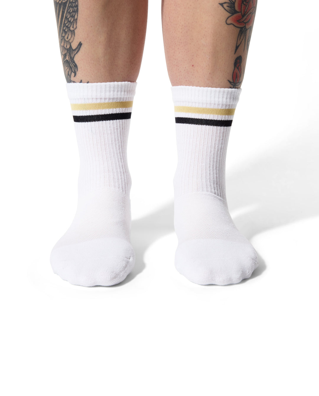 The Tiger Eye Triple Double Crew Socks are designed for versatility and comfort, featuring a fully padded foot and a relaxed ribbed cuff. Ideal for cycling, running, cross-training, or casual wear, these socks are made in the USA from recycled fibers, combining performance with sustainability