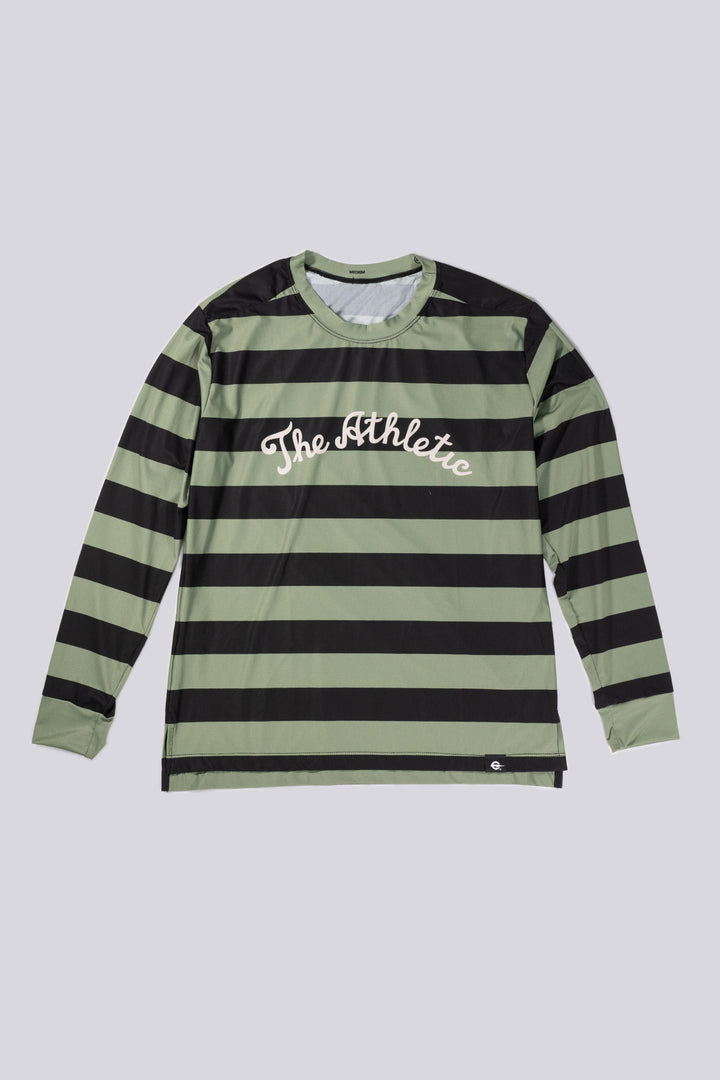The Men's Stripes Tech Tee is a long-sleeve, moisture-wicking shirt designed for colder runs or gravel rides. Featuring a bold stripe pattern, this limited-run tee pairs well with The Athletic's iceberg socks, Death Palm, or El Sol designs. Crafted in California from Italian fabrics by Endo Customs, it offers both style and performance for active individuals