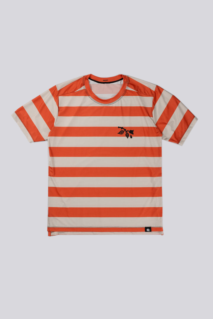 The Men's Waldo Short Sleeve Tech Tee is a versatile performance shirt designed for activities like running, cycling, and cross-training. Crafted in California from Italian-engineered fabrics, it features a lightweight, breathable design with a split side seam at the hem to accommodate lower body movement. This timeless striped tee, adorned with a black rose on the upper left chest, offers both style and functionality for active individuals