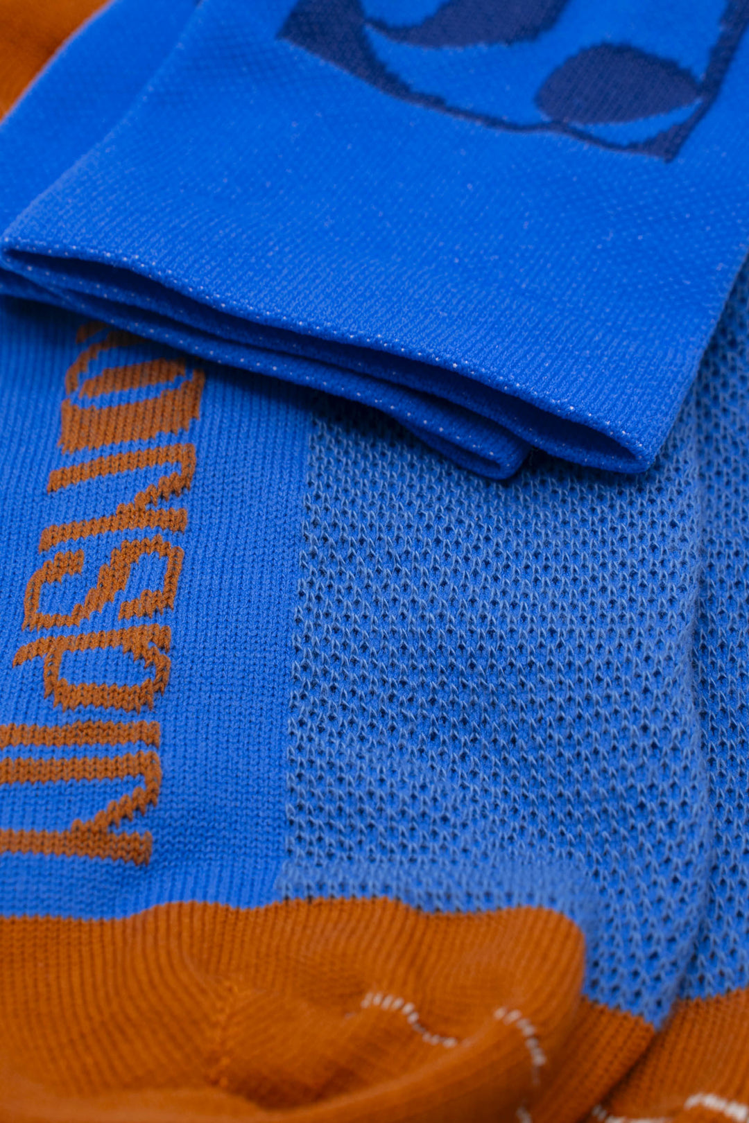 The Moonspin x The Athletic Socks are a collaboration between Moonspin, a women-led mountain biking apparel brand, and The Athletic Community. These socks are available in two colorways: Navy and Blue. Designed to inspire and style your biking adventures, they combine performance with style. Made in the USA with synthetic fibers from post-consumer recycled water bottles, these lightweight socks are breathable, moisture-wicking, and durable—ideal for warm weather cycling and everyday adventures