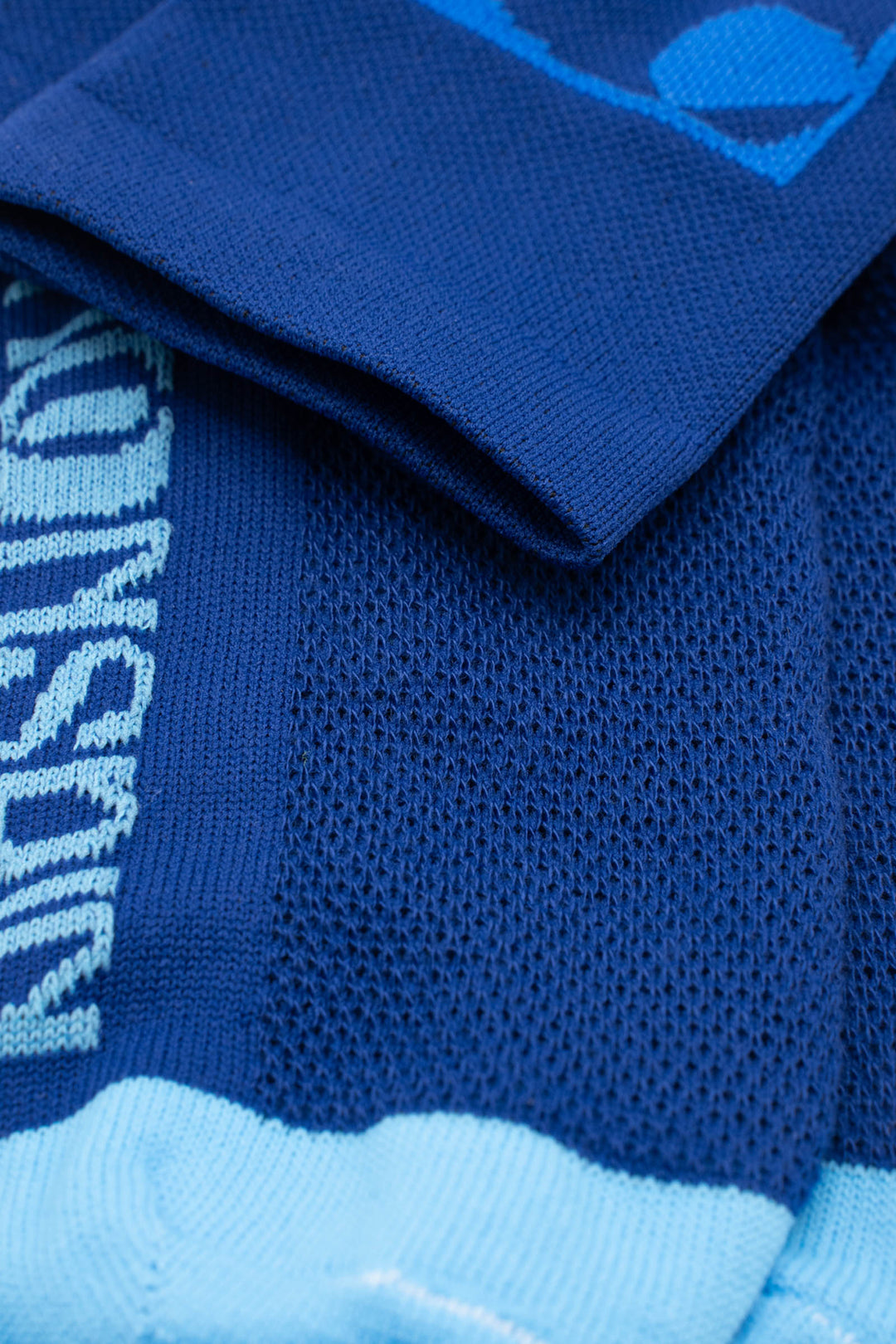 The Moonspin x The Athletic Socks are a collaboration between Moonspin, a women-led mountain biking apparel brand, and The Athletic Community. These socks are available in two colorways: Navy and Blue. Designed to inspire and style your biking adventures, they combine performance with style. Made in the USA with synthetic fibers from post-consumer recycled water bottles, these lightweight socks are breathable, moisture-wicking, and durable—ideal for warm weather cycling and everyday adventures