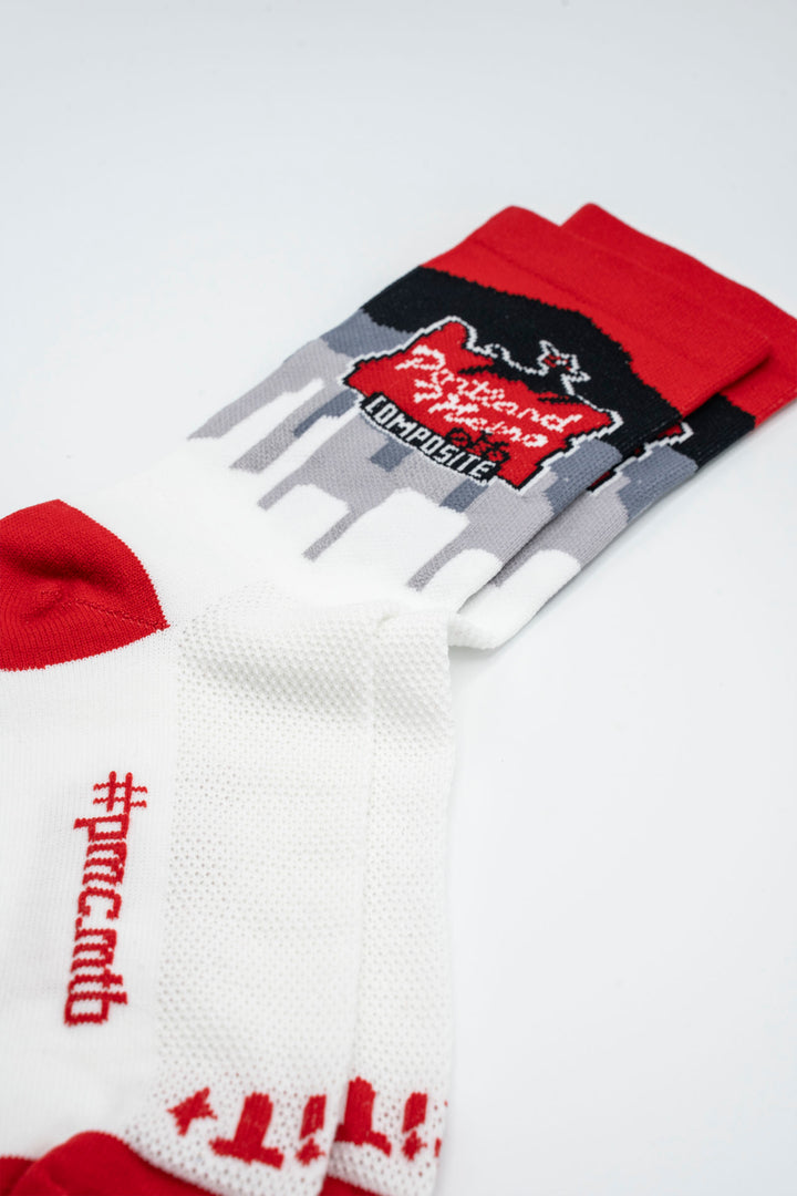 The Athletic Community's Custom Sock Program offers high-quality, eco-friendly socks made in the USA, ideal for cycling teams, running clubs, corporate gifts, or large family events.  You can submit your design or logo, and their team will collaborate with you to create the perfect custom socks