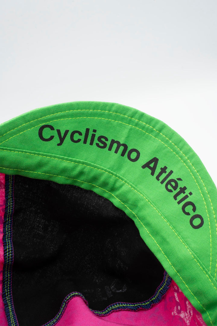 The Athletic Super Tuff Strawberry Cycling Cap is a vibrant, unstructured 3-panel cap featuring a bold strawberry design. Crafted in the Portland, OR, by Double Darn, this cap offers a comfortable fit.