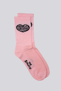 Pink sock with a heart design on either side for running or cycling
