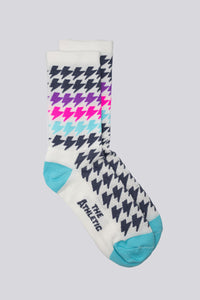 Grey sock with black, purple, teal, pink lightning bolts for running and cycling