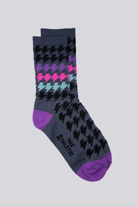 Grey sock with black, purple, teal, pink lightning bolts for running and cycling