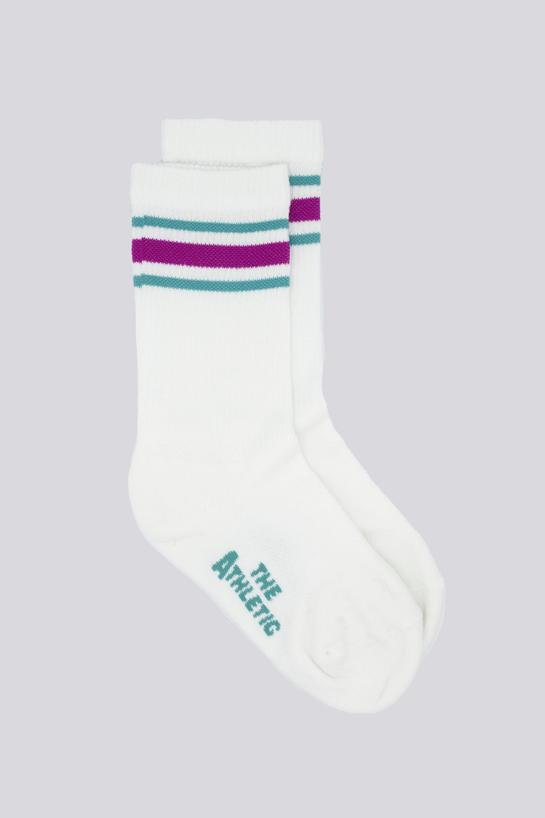 The Merry Berry Triple Double Crew Socks are designed to keep you cozy during colder weather activities. Featuring a fully padded foot for enhanced cushioning and warmth, these socks are ideal for running, cycling, hiking, or casual walks. The relaxed cuff ensures a comfortable fit around the calves. Lovingly known as "Cushy Spice" at The Athletic HQ, these socks are made in the USA from recycled fibers, combining performance with sustainability
