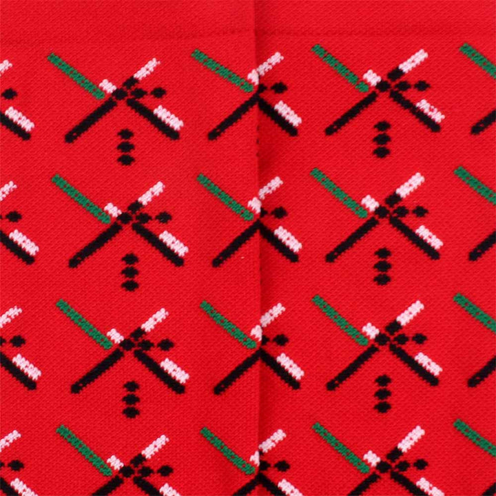 The PDX Futbol Fan Sock Home Red is a tribute to Portland's local soccer team, featuring the iconic PDX Airport carpet design in red, green, and black. Ideal for cycling, running, and cross-training, these socks combine style and performance. Made in the USA with recycled fibers, they offer both durability and sustainability