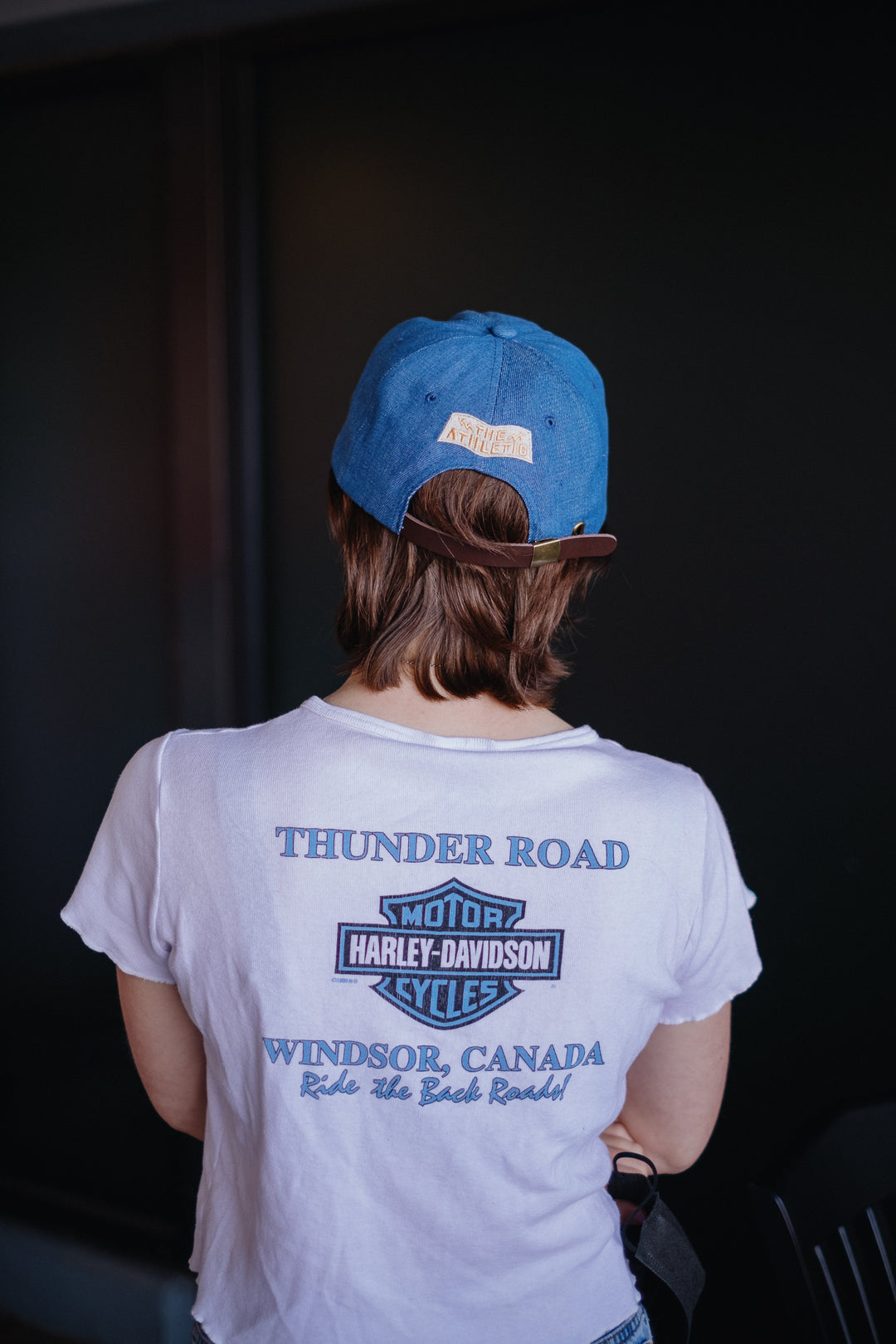 The Athletic Wavy A Denim Hat is a 100% cotton denim cap featuring the embroidered "Wavy A" logo, symbolizing The Athletic's blend of past and future. Designed in collaboration with Young Jerks, this hat offers a timeless, denim aesthetic suitable for various off-bike activities